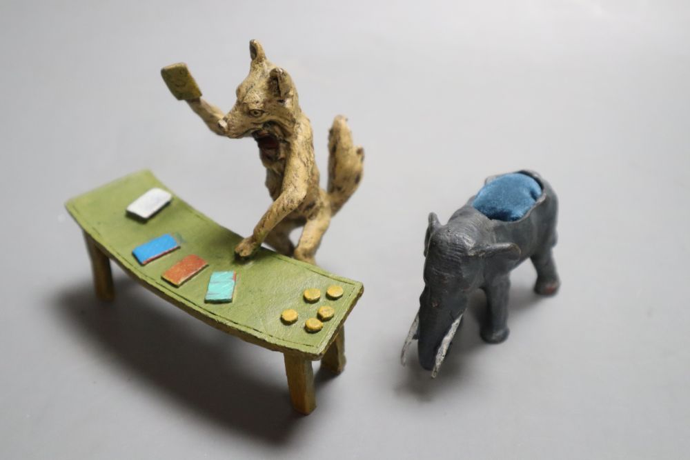A Bergman style cold painted bronze comical fox playing at a table, indistinctly signed, width 10.5cm and a cold painted bronze elephan